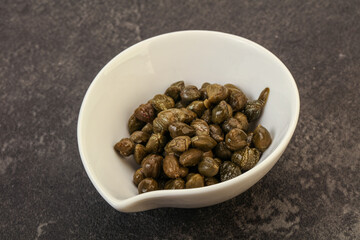 Tasty capers in the bowl