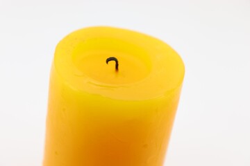 yellow candles on a white background