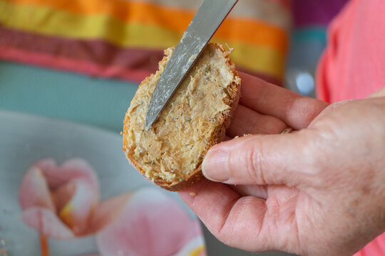 Spreading Rillette On Bread For A Starter