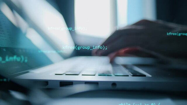 Close up hand of developing programming and coding technologies. Programmer hand typing on keyboard. Put on the wood table at night. Programmer concepts.