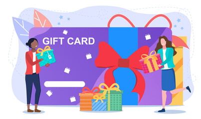 Shopping gift card abstract concept. With two girls holding boxes of gifts in the background of a giant payment gift card