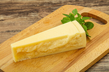 Hard parmesan cheese served basil