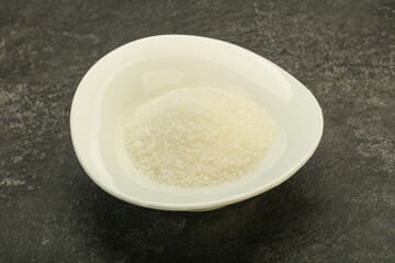 White sugar in the bowl