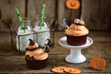 Halloween cupcakes with cottage cheese cream and mastic witch hat.