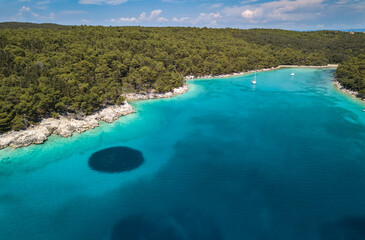 Aerial view on the beautiful bay on Rab island in Croatia. Turquoise color Adriatic sea of Dundo beach in Kampor, Rab Island