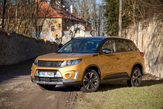 Suzuki Vitara AllGrip. A car near a country house. General view. 02-14-2019, Middle Bohemia, Czech Republic.