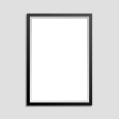 Black frame with white background and shadow on a gray wall