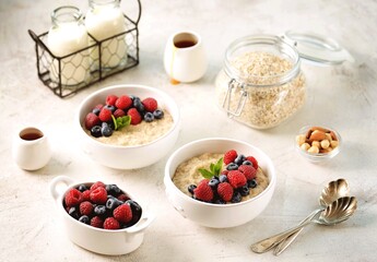 Oatmeal with fresh blueberries and raspberries. Healthy breakfast.