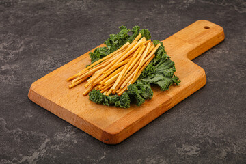 Chechel cheese sticks over board