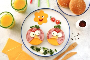 Sandwiches with hum and cheese. Funny food for kids'.