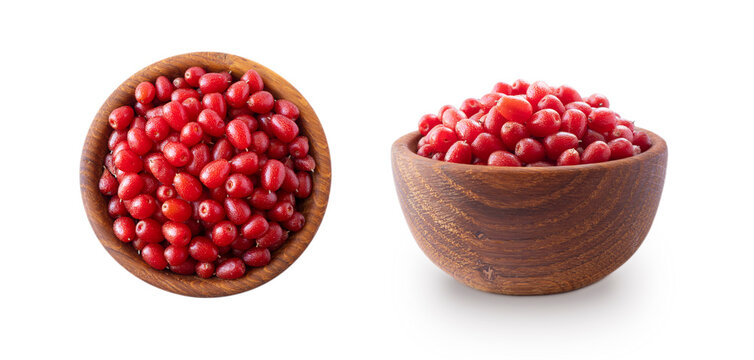 Elaeagnus multiflora (Goumi, Gumi, Natsugumi, or Cherry silverberry), is a species of Elaeagnus native to China, Korea, and Japan. Heap of gumi berries in a wooden bowl. Cherry silverberry isolated.