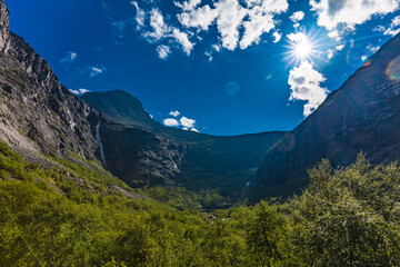 Trollstigen or Trolls Path is a serpentine mountain road in Norway