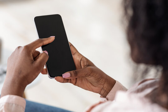 Unrecognizable African American Female Browsing Smartphone With Black Screen, Mockup Image