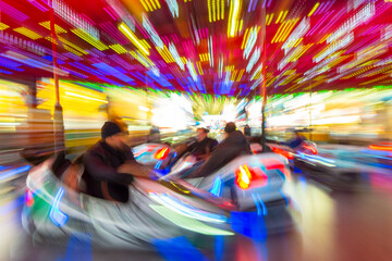 Motion Blurred Dodgems or Bumper Cars at a Fun Fair - 383126900