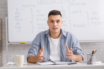 Remote work, lessons and online education during coronavirus epidemic at home. Handsome young man...