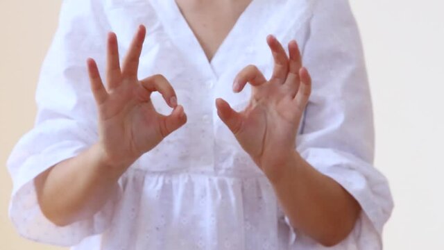 Brain Development: learning and practising asynchronous Finger and Hand Exercises. Ok and thumbs up gestures