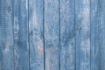 Fototapeta na wymiar Old wooden blue background from different boards.