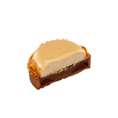 Half of glazed mini tart with cream isolated on a white