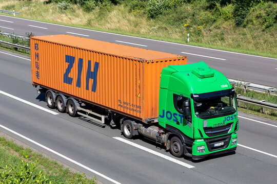 WIEHL, GERMANY - JUNE 25, 2020: Jost Iveco Stralis truck with ZIH container on motorway.