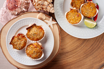 .Traditional Brazilian dish called Casquinha de siri. Crab meal gratin. Top view. Copy space