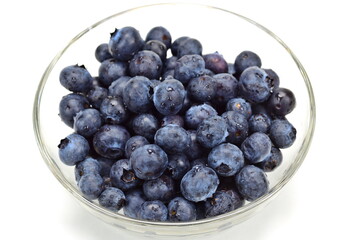 Ripe blueberries on a white background