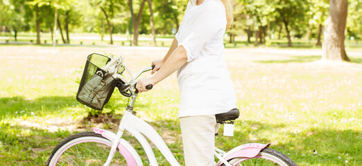 Naklejka premium Happy Woman with the Bike