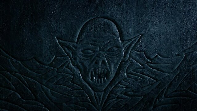 Demon Stone Carving In Heavy Rainfall
