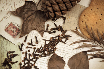 Flat Lay of autumn leaves, old letters and cookies