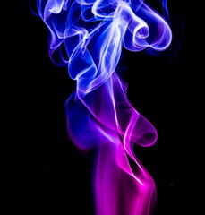 Obraz premium Colored smoke on black background