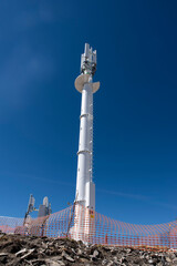 Telephony relay antenna on a mountain peak

