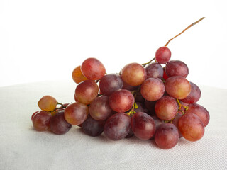 Bunch of grapes on a white background
