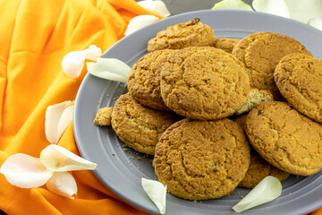 cookies with rose petals on the table