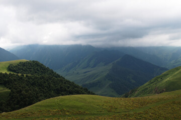Fototapeta na wymiar Stunning view from the pass Aktoprak in Caucasus mountains, Russia.