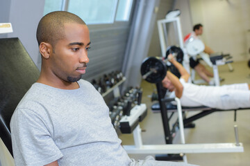 Fototapeta na wymiar portrait of man in the gym