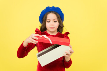 teen girl open present box on her birthday holiday celebration, gift