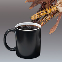 Black coffee in mug and Indian corn still life with copyspace.  Taupe background with steaming hot coffee in a black cup.