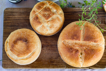 three italians breads on the wooden plate