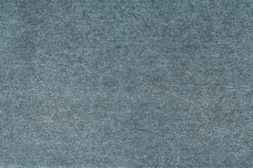 Vintage and old looking paper background. Colored blue retro book cover. Ancient book page.