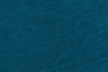 Vintage and old looking paper background. Colored blue retro book cover. Ancient book page.