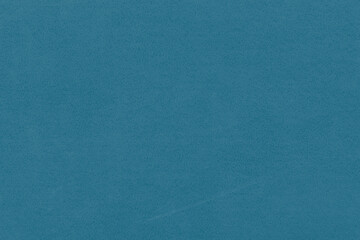 Vintage and old looking paper background. Colored blue retro book cover. Ancient book page.