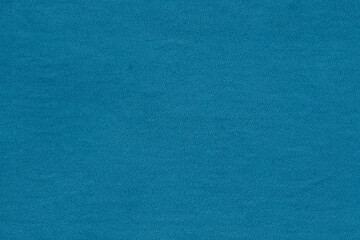 Vintage and old looking paper background. Colored blue retro book cover. Ancient book page.