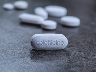 Obraz na płótnie Canvas Colchicine Tablet Closeup