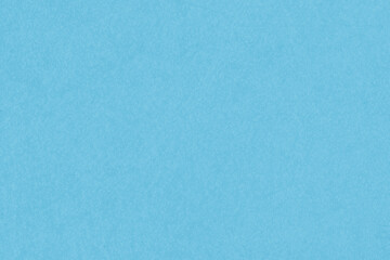 Vintage and old looking paper background. Colored blue retro book cover. Ancient book page.