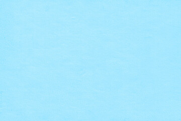 Vintage and old looking paper background. Colored blue retro book cover. Ancient book page.