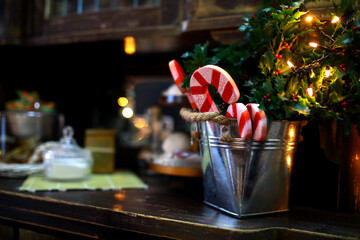 Christmas background, celebration, New Year's eve party concept. Christmas candy in a bucket. Beautiful embellishments, homemade gingerbread cookies and decorations, festive food