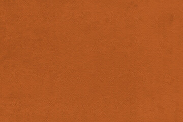 Vintage and old looking paper background. Colored orange with a brown retro book cover. Ancient book page.