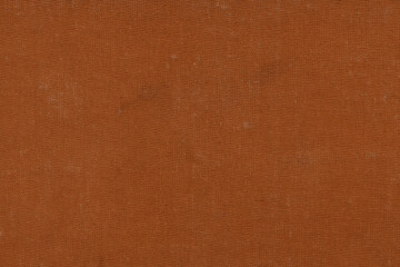 Vintage and old looking paper background. Colored orange with a brown retro book cover. Ancient book page.