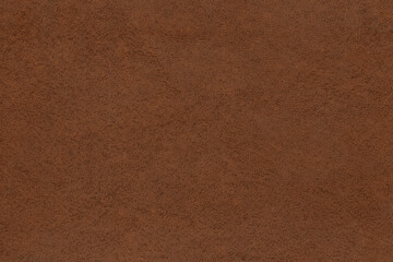 Vintage and old looking paper background. Colored orange with a brown retro book cover. Ancient book page.