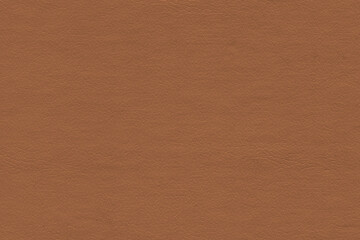 Vintage and old looking paper background. Colored orange with a brown retro book cover. Ancient book page.