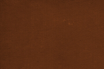 Vintage and old looking paper background. Colored orange with a brown retro book cover. Ancient book page.